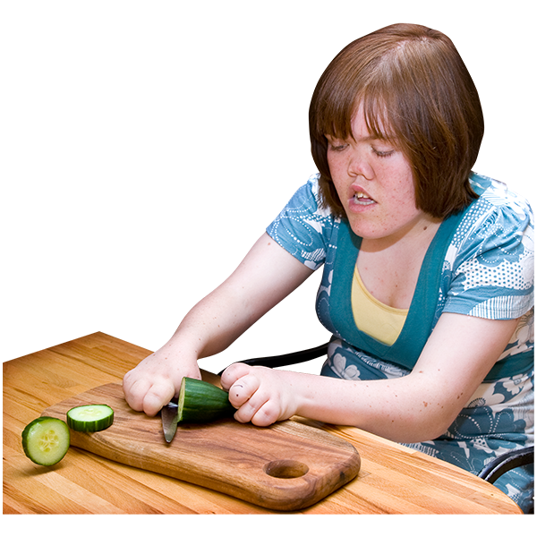 CASBA a woman chopping a cucumber
